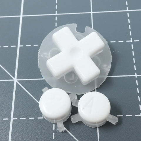 Hand cast custom resin buttons for Nintendo Game Boy original DMG-01 - Pudding caps white [GB] | Lab Fifteen Co
