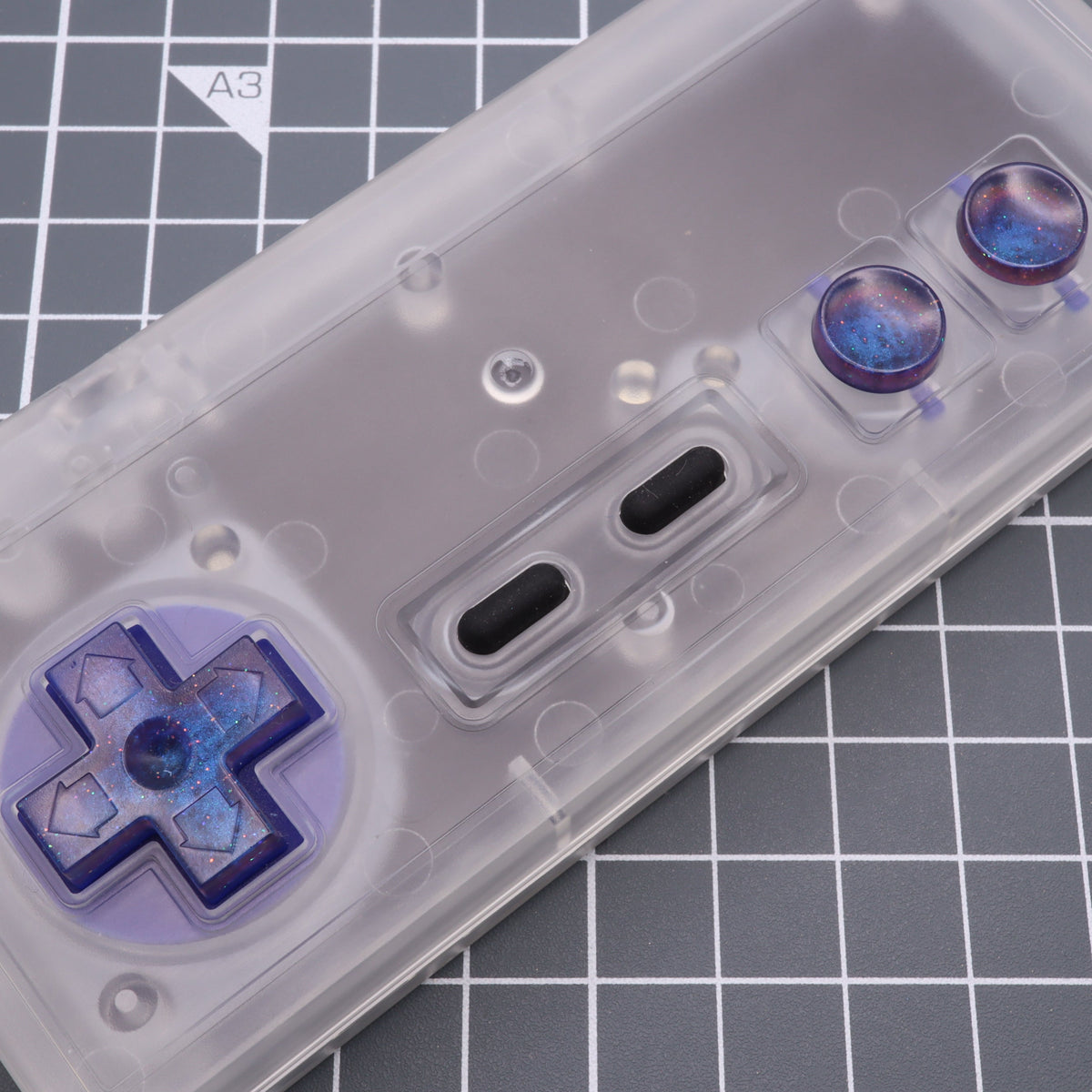 Hand cast custom resin buttons for Nintendo NES controller NES-004 (also fits Game Boy DMG-01) - Cosmic Blue | Lab Fifteen Co