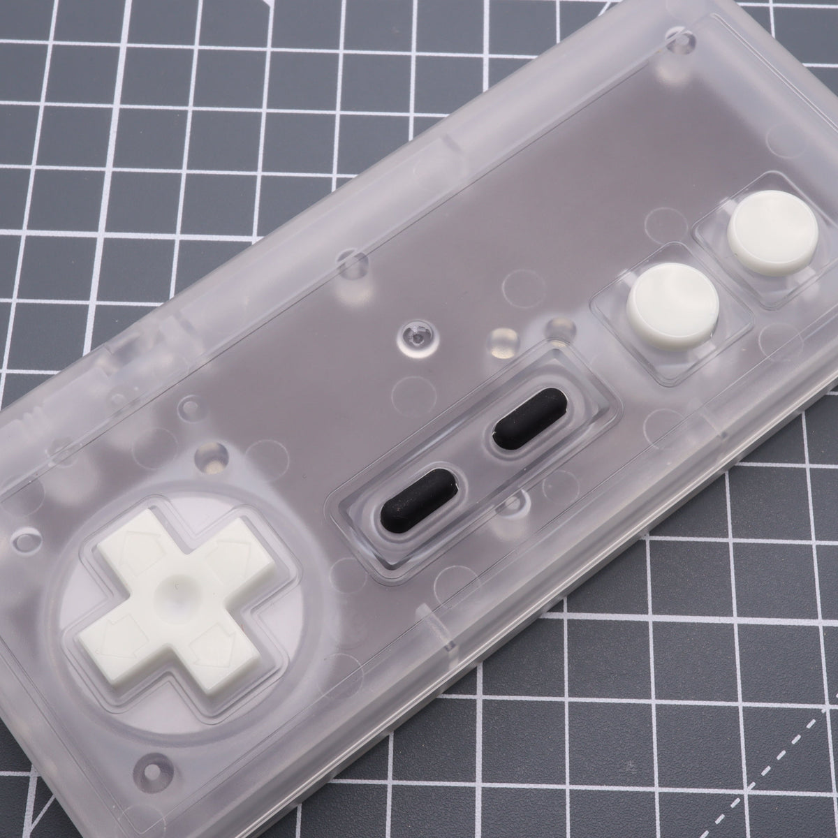 Hand cast custom resin buttons for Nintendo NES controller NES-004 (also fits Game Boy DMG-01) - Glow in the Dark Green | Lab Fifteen Co