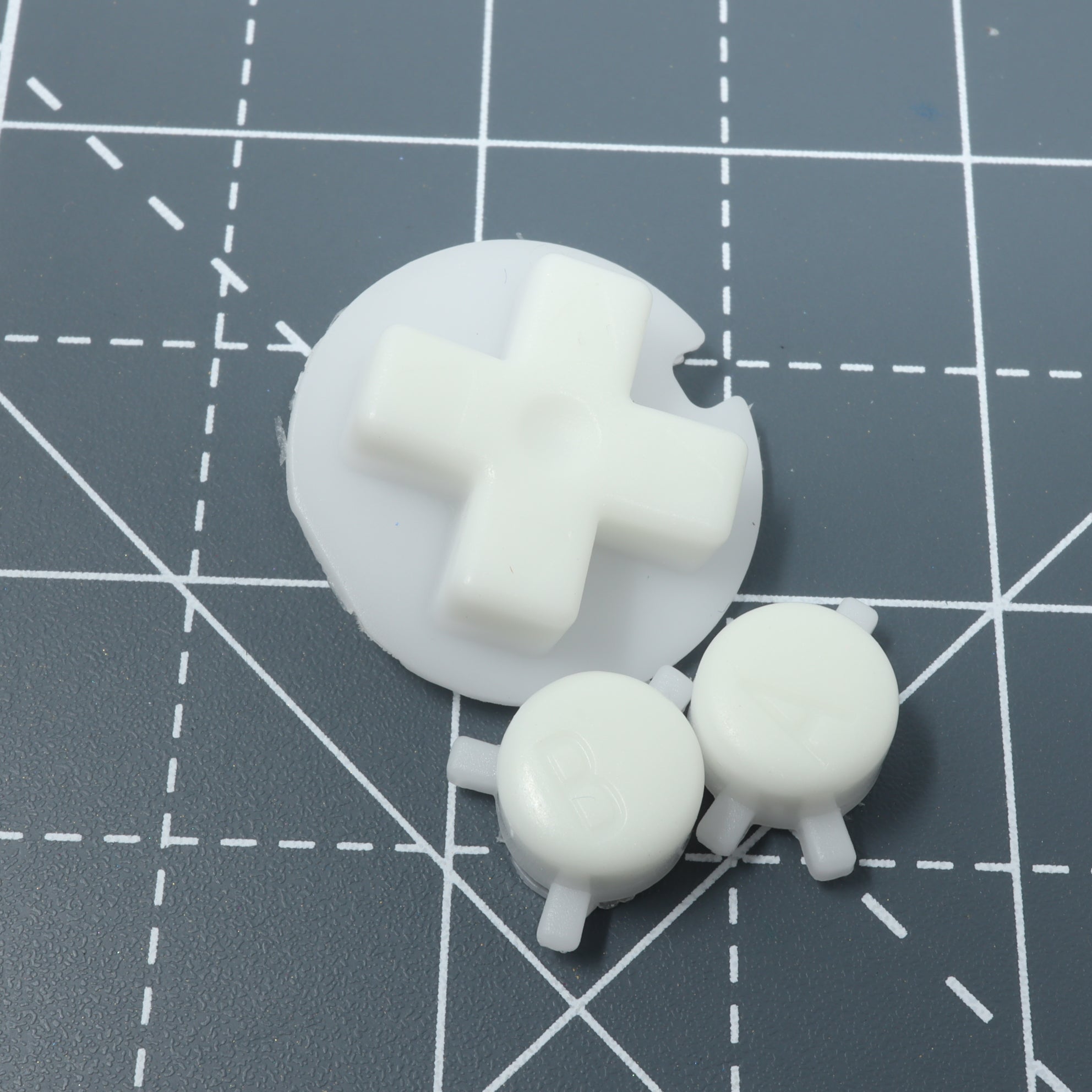 Hand cast custom resin buttons for Nintendo Game Boy Pocket MGB-001 GBP - Glow in the dark blue | Lab Fifteen Co