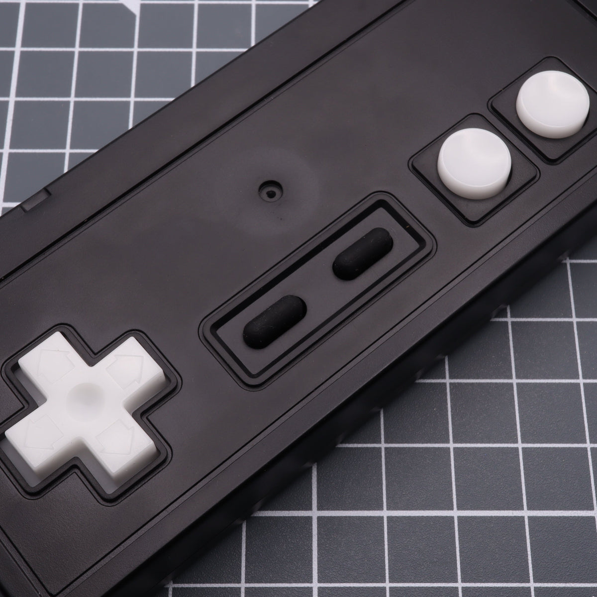 Hand cast custom resin buttons for Nintendo NES controller NES-004 (also fits Game Boy DMG-01) - Glow in the Dark Aqua | Lab Fifteen Co