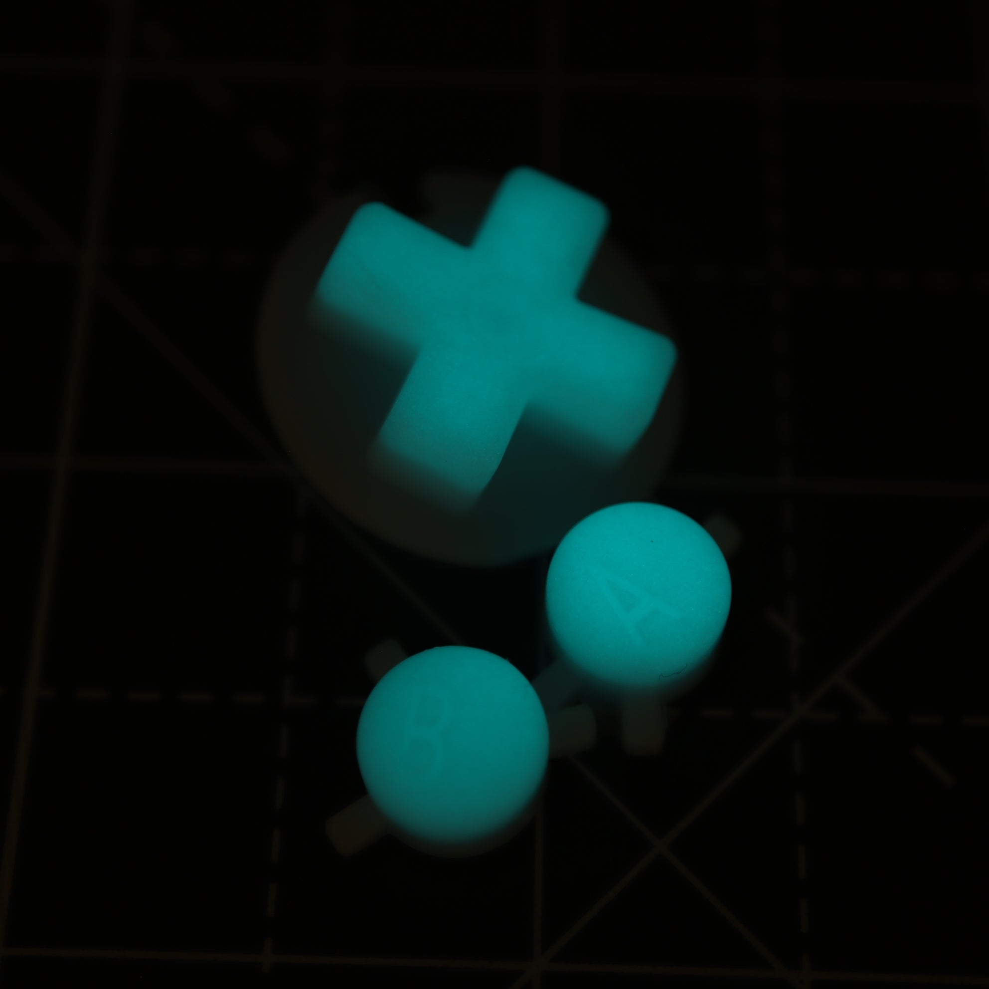 Hand cast custom resin buttons for Nintendo Game Boy Color - Glow in the dark Aqua | Lab Fifteen Co - 1