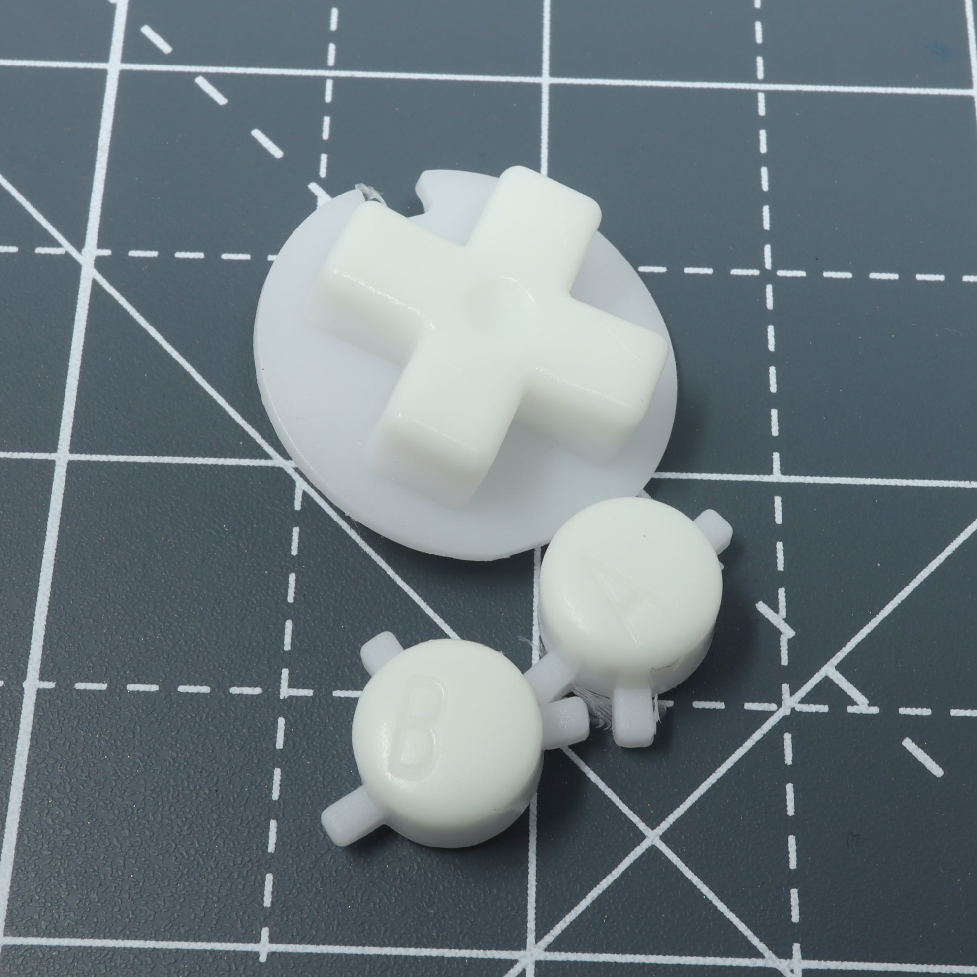 Hand cast custom resin buttons for Nintendo Game Boy Color - Glow in the dark Aqua | Lab Fifteen Co - 2