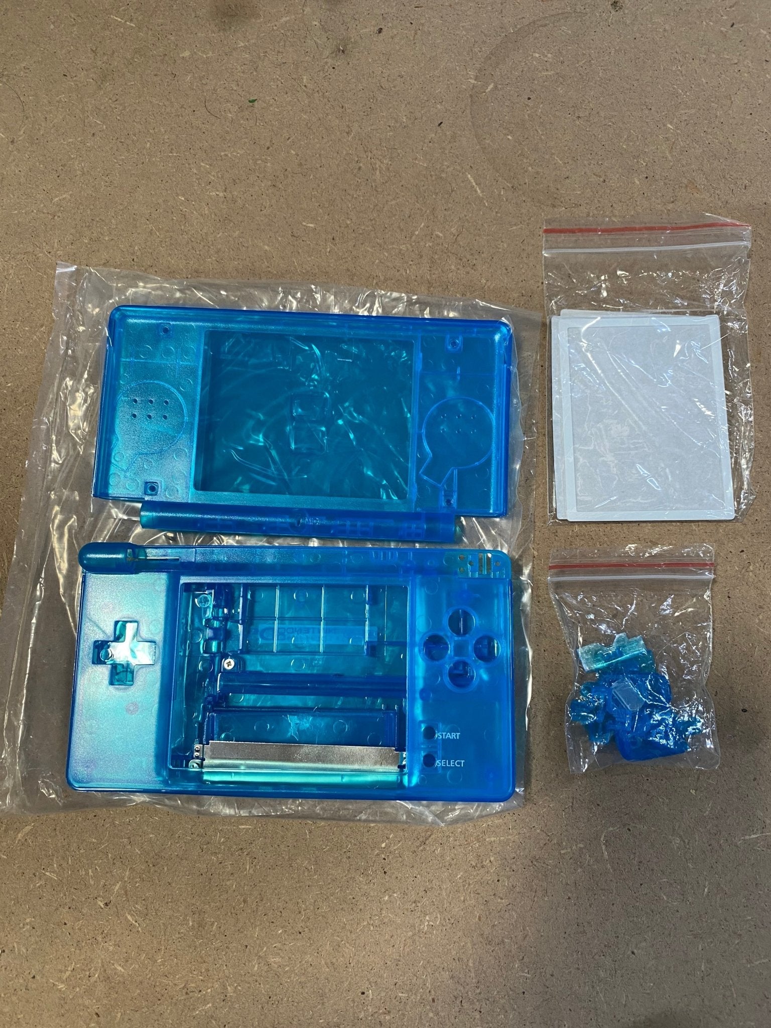 Housing shell for Nintendo DS Lite - Clear blue | Incomplete clearance 100002 - 1